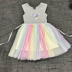Precious multi-color unicorn dress! Sure to be your daughters favorite!